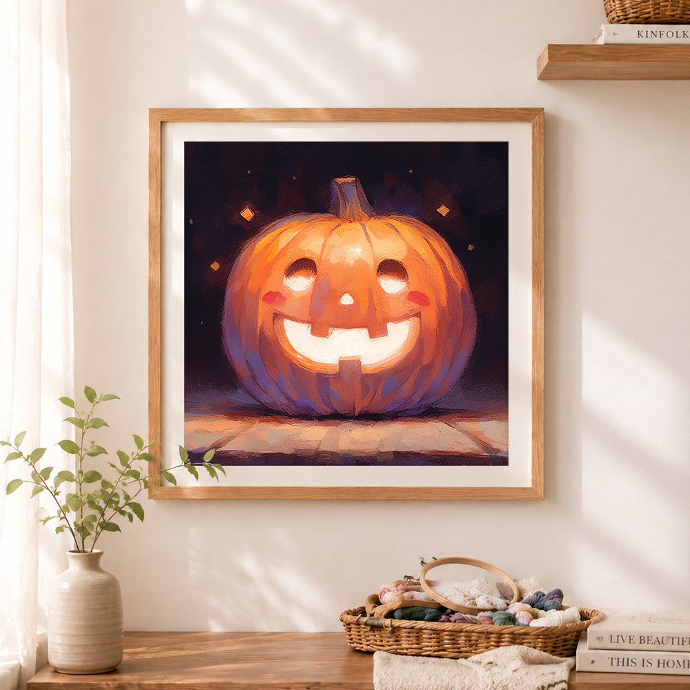 Finished smiling jack-o-lantern cross stitch artwork displayed as home decor
