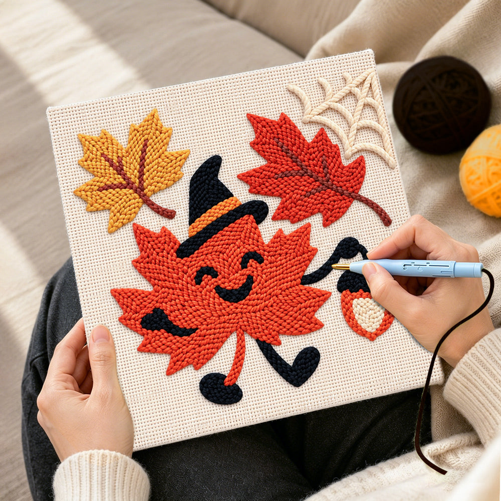 Creating handmade smiling maple leaf with witch hat punch needle artwork