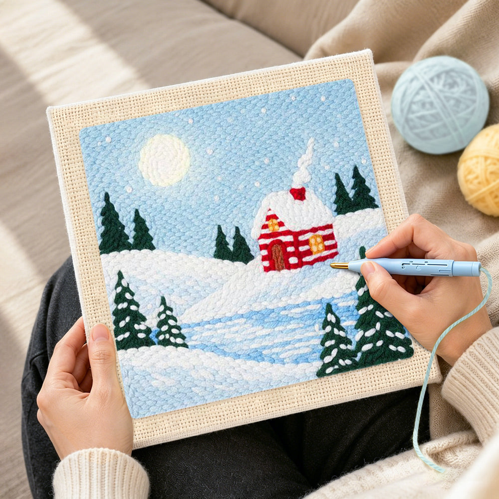 Creating handmade snow cabin in moonlight punch needle artwork