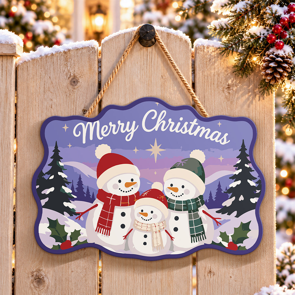 Snowman family christmas paint by numbers door hanger on a garden gate