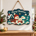 Snowman family with cozy cottage paint by numbers door hanger as indoor wall decor