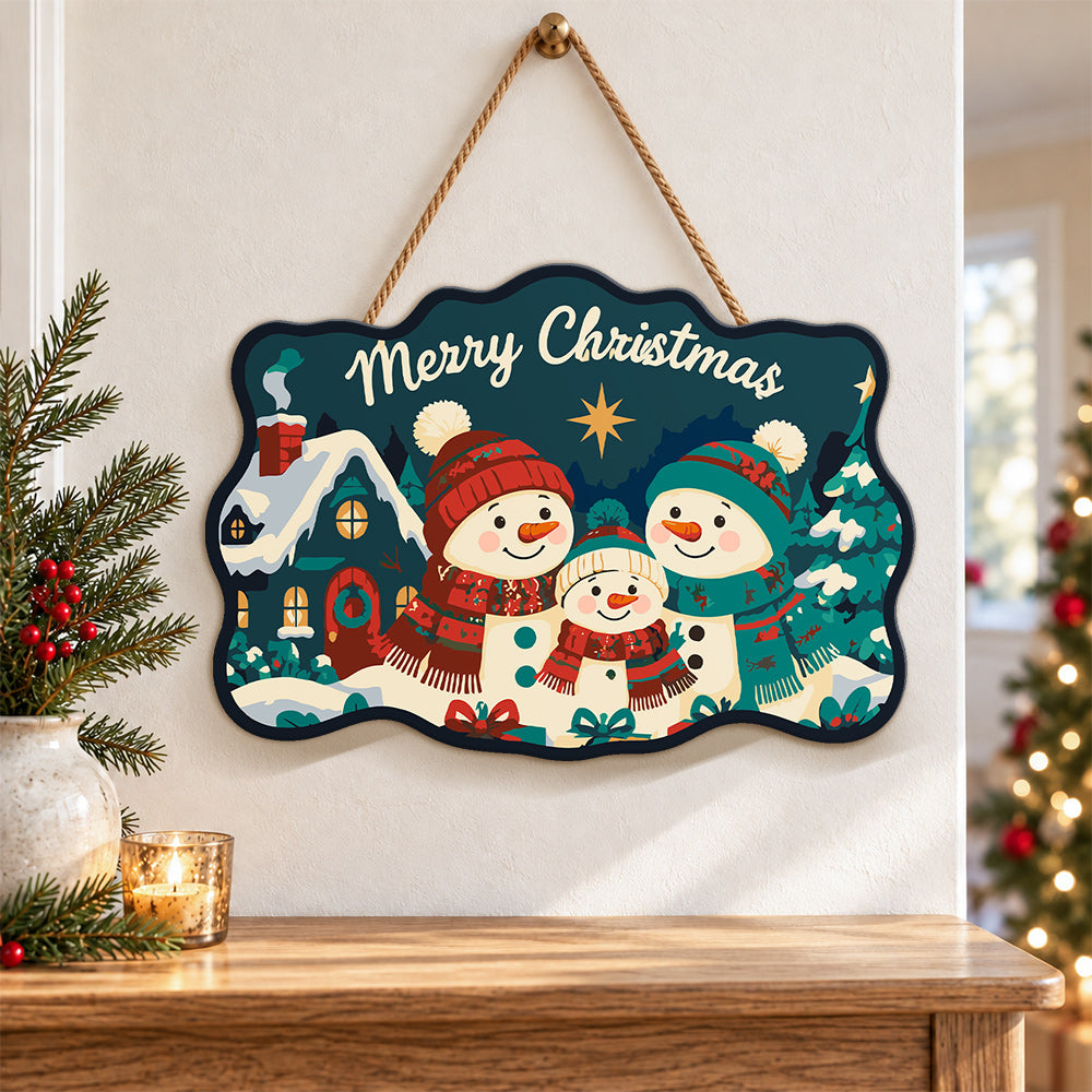 Snowman family with cozy cottage paint by numbers door hanger as indoor wall decor