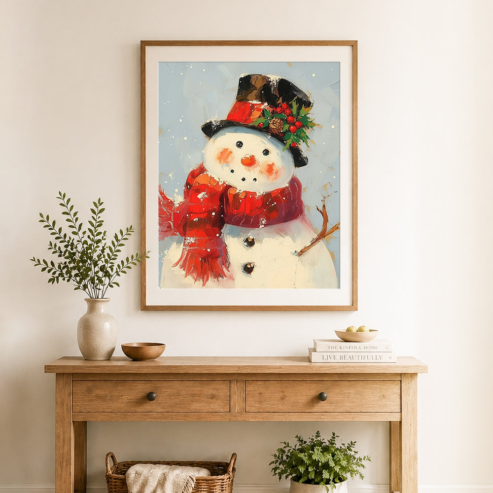 Finished snowman with top hat and red scarf cross stitch artwork displayed as home decor