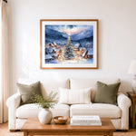 Finished snowy christmas village with glowing tree cross stitch artwork displayed as home decor