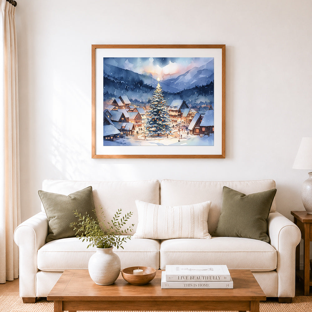 Finished snowy christmas village with glowing tree cross stitch artwork displayed as home decor
