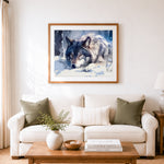 Finished snowy gray wolf resting in winter forest cross stitch artwork displayed as home decor