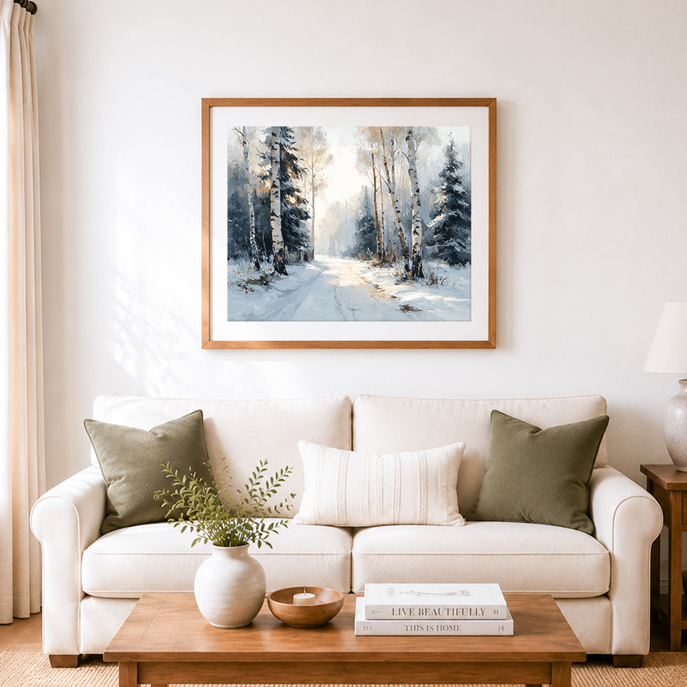 Finished snowy path through birch and pine forest cross stitch artwork displayed as home decor