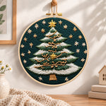 Snowy striped christmas tree embroidery hoop wall art displayed as warm and cozy handmade home decor