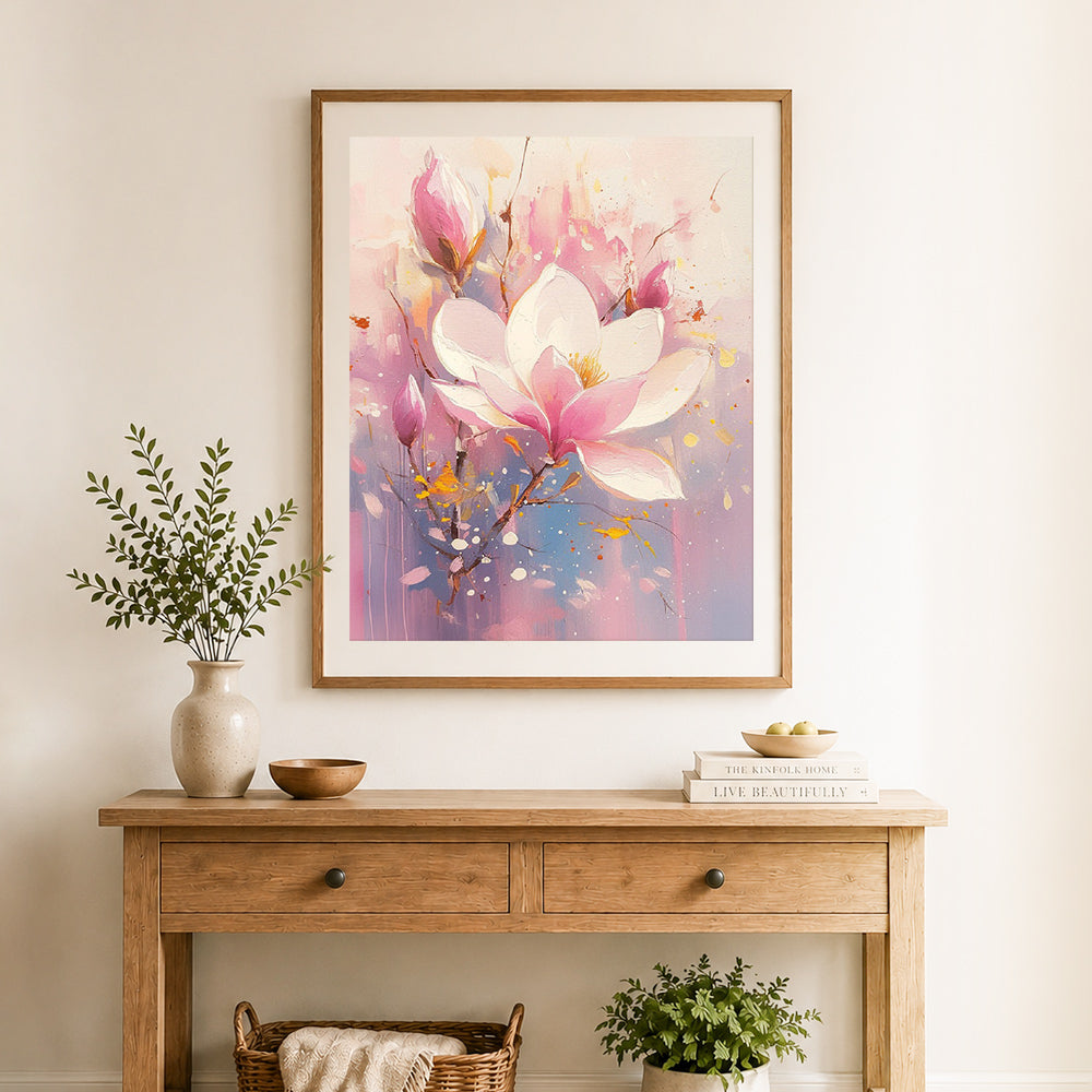 Finished soft magnolia blossoms cross stitch artwork displayed as home decor