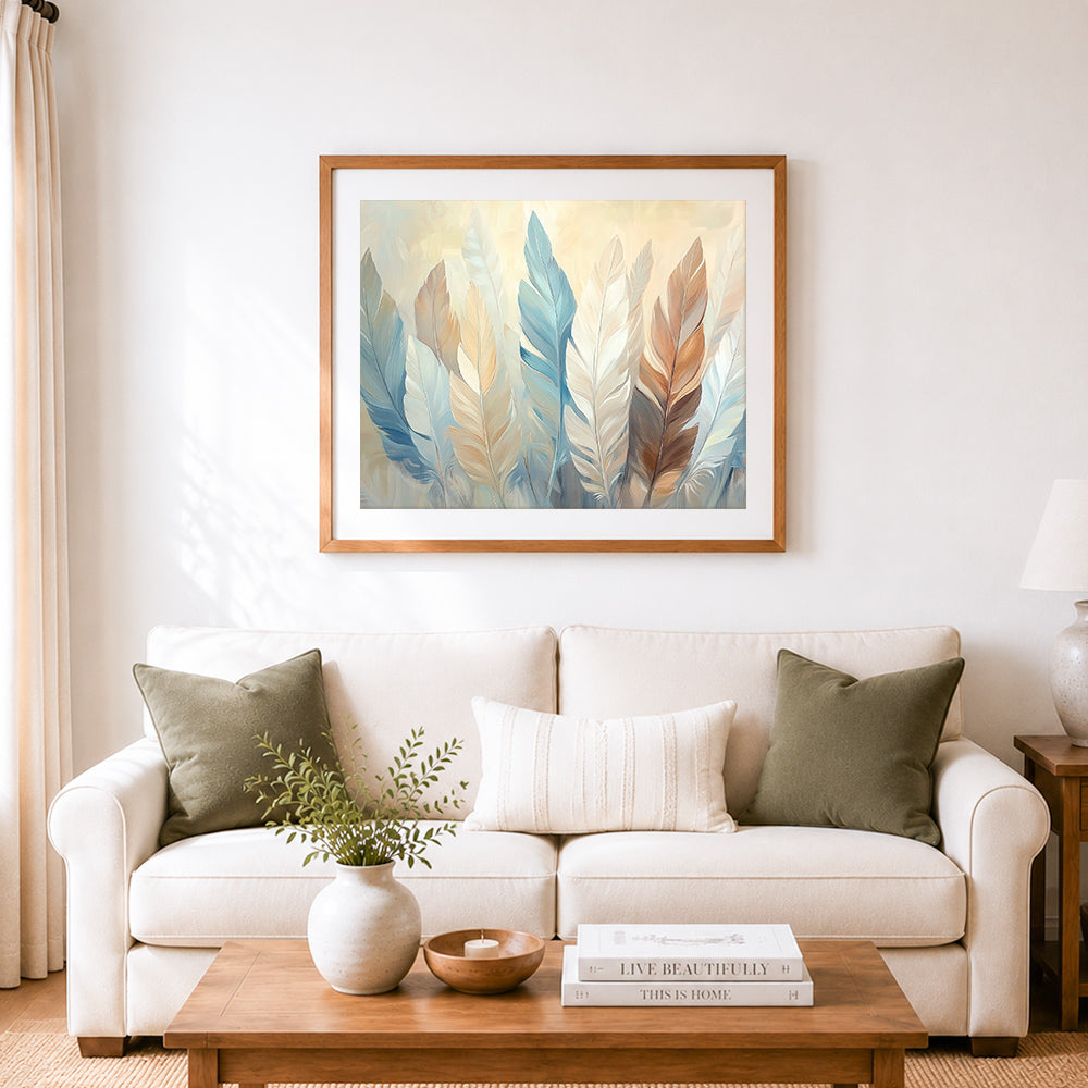 Finished soft neutral feather art cross stitch artwork displayed as home decor