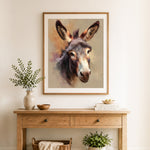 Finished soft painted donkey cross stitch artwork displayed as home decor
