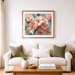 Finished soft pastel peony blooms cross stitch artwork displayed as home decor