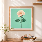 Finished soft peach wild rose illustration cross stitch artwork displayed as home decor