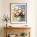 Finished soft pink roses cross stitch artwork displayed as home decor