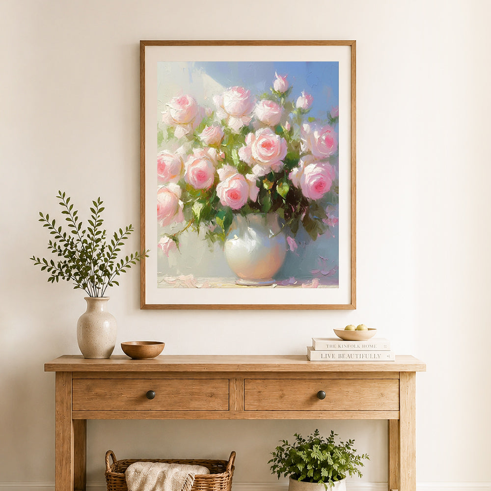 Finished soft pink roses cross stitch artwork displayed as home decor