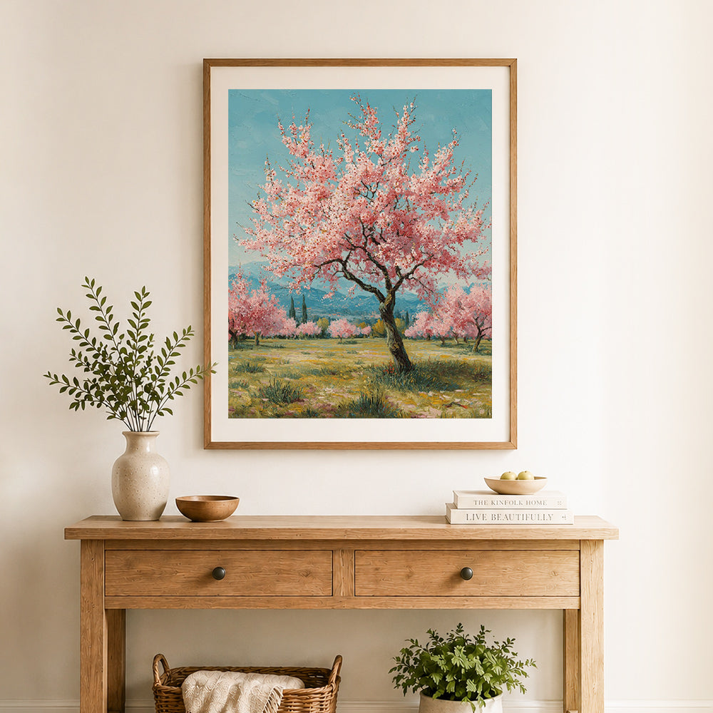 Finished soft spring cherry blossoms cross stitch artwork displayed as home decor
