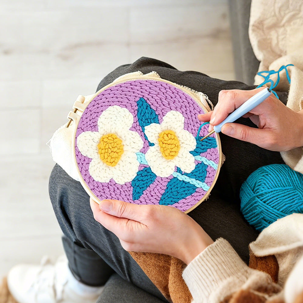 Creating handmade soft white flowers punch needle artwork