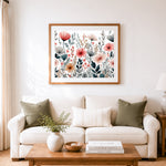 Finished soft wildflower pattern cross stitch artwork displayed as home decor