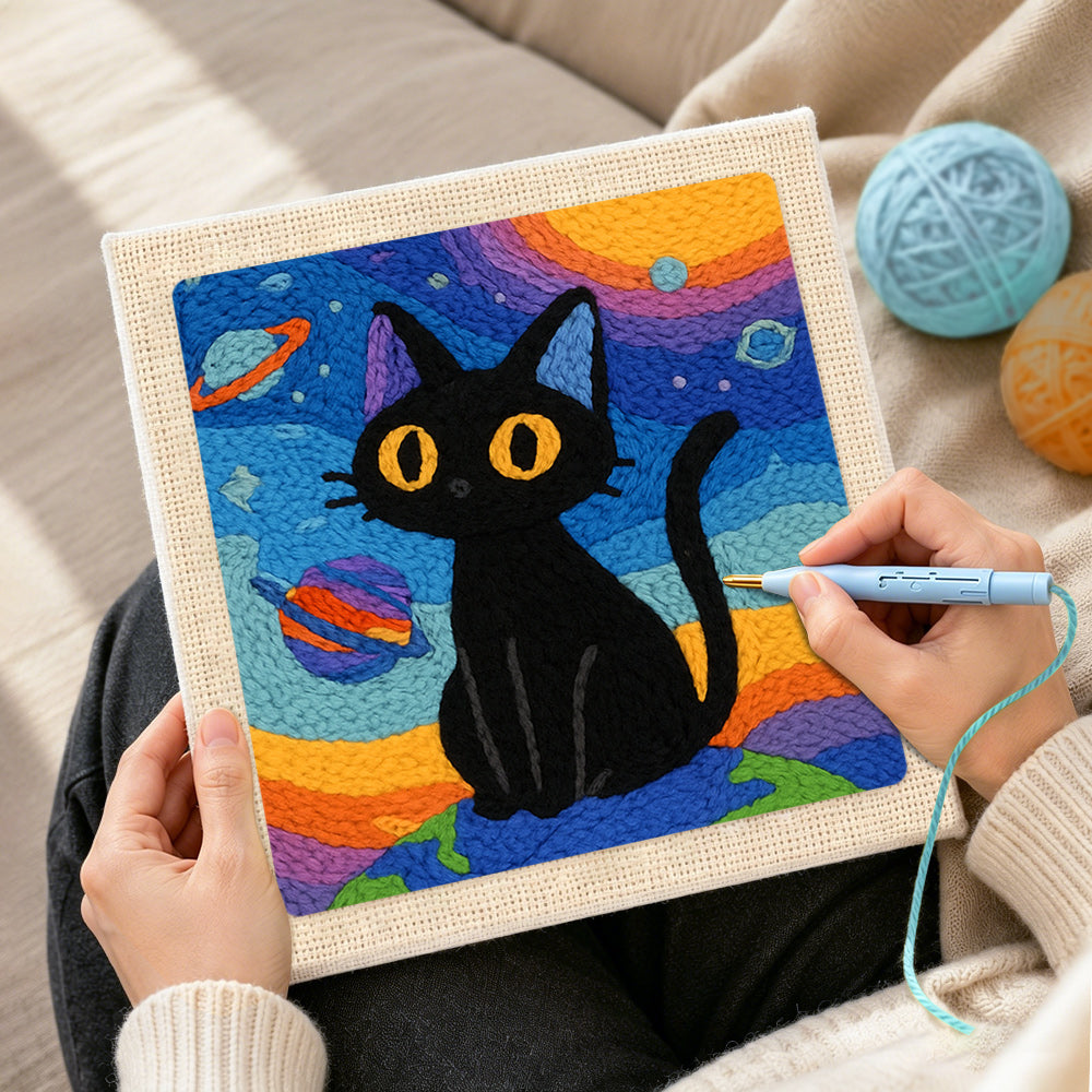 Creating handmade space black cat with yellow eyes punch needle artwork