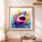 Finished splatter art great white shark cross stitch artwork displayed as home decor