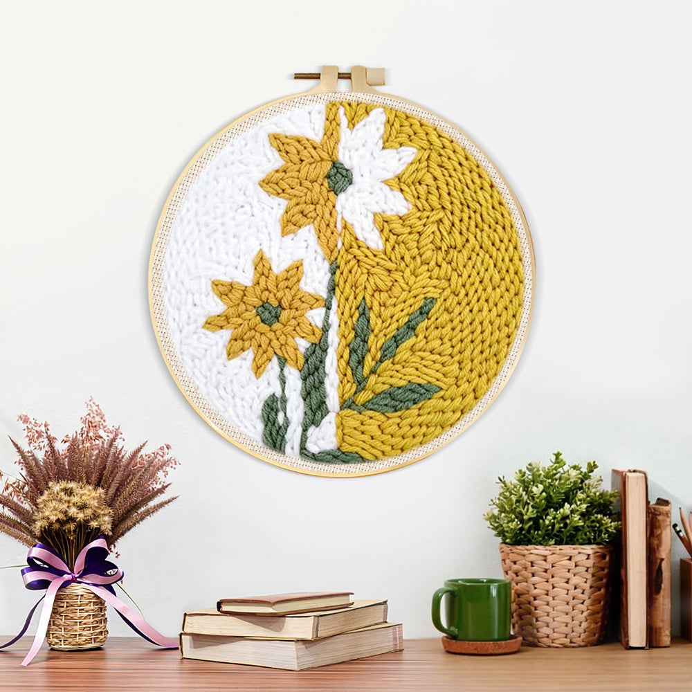 Finished split-tone dandelion flower artwork displayed on a wall