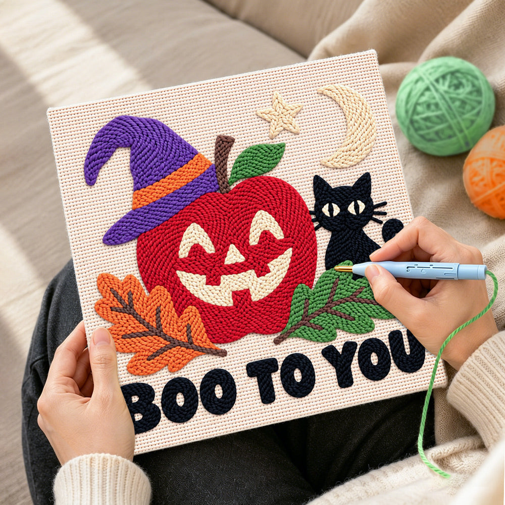 Creating handmade spooky apple face punch needle artwork