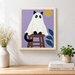 Finished spooky ghost cat on stool artwork displayed on a wall