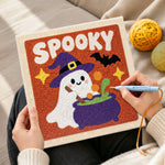 Creating handmade spooky ghost with cauldron punch needle artwork
