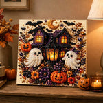 Finished spooky halloween haunted house pearl diamond painting artwork displayed as holiday home decor