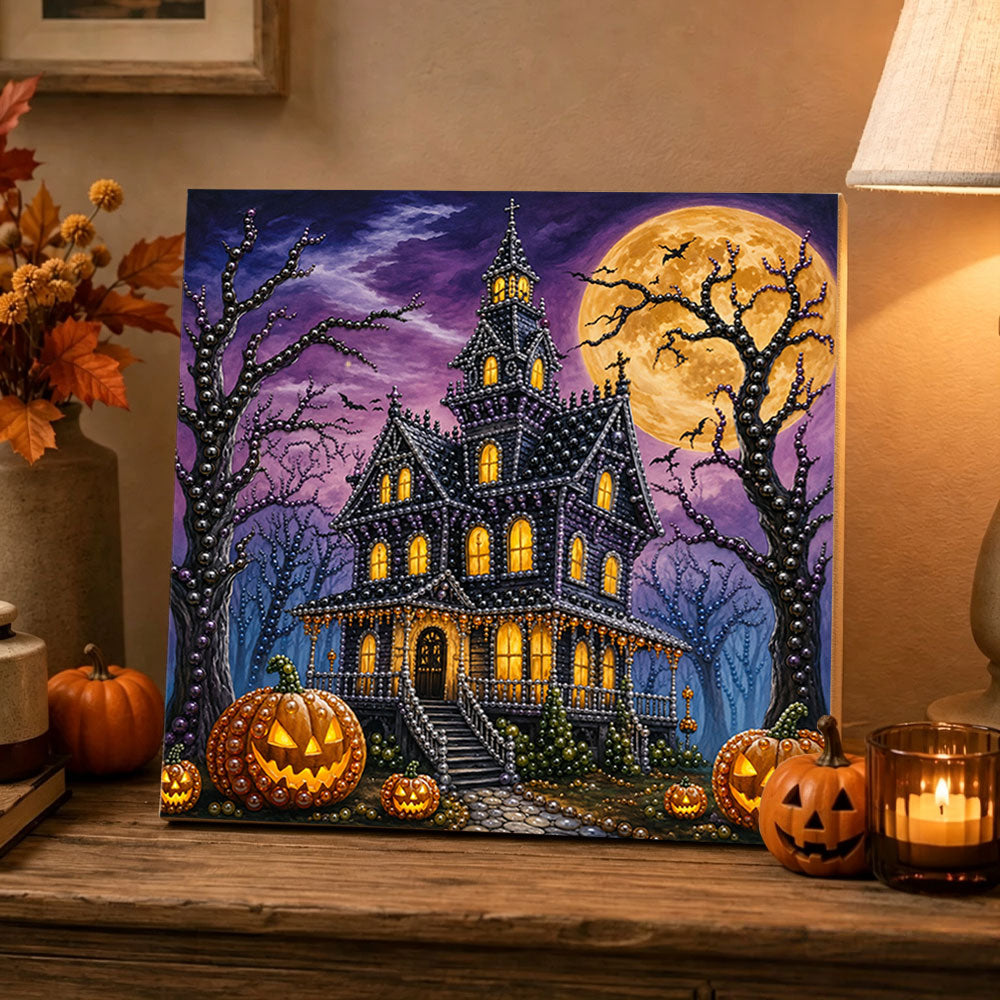 Finished spooky haunted mansion pearl diamond painting artwork displayed as holiday home decor