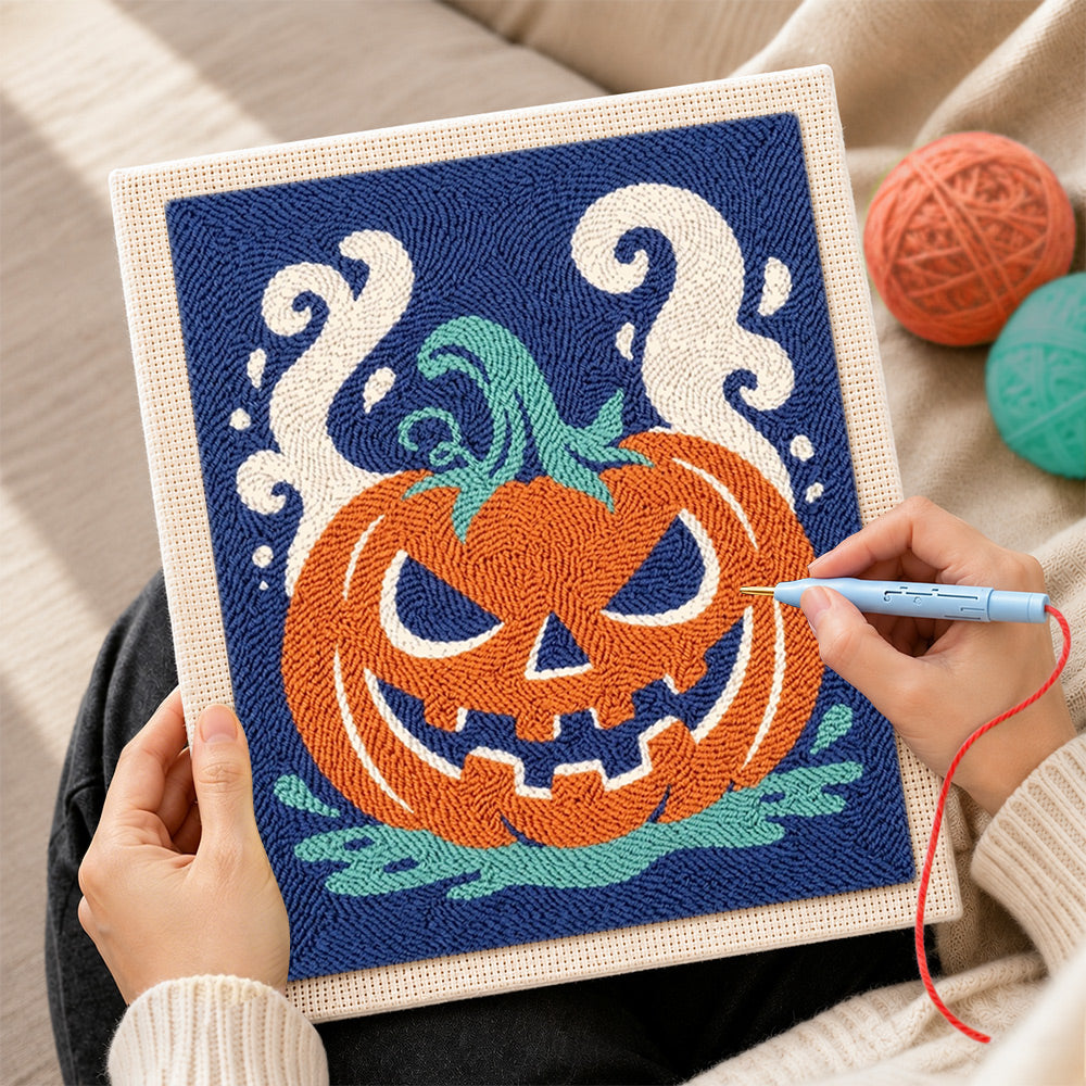 Creating handmade spooky jack‑o‑lantern punch needle artwork