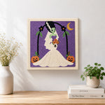 Finished spooky monster bride artwork displayed on a wall