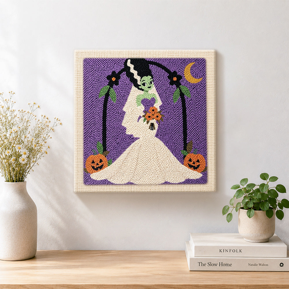 Finished spooky monster bride artwork displayed on a wall