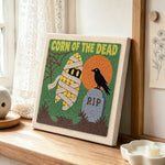 Spooky mummy corn punch needle artwork displayed on a table