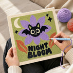 Creating handmade spooky night bloom punch needle artwork
