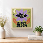Finished spooky night bloom artwork displayed on a wall