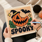 Creating handmade spooky pumpkin jack punch needle artwork
