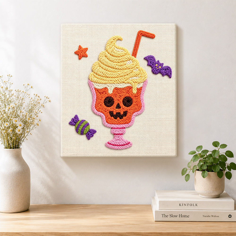 Finished spooky skull ice cream cup artwork displayed on a wall