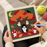 Creating handmade spooky tree with little ghosts punch needle artwork
