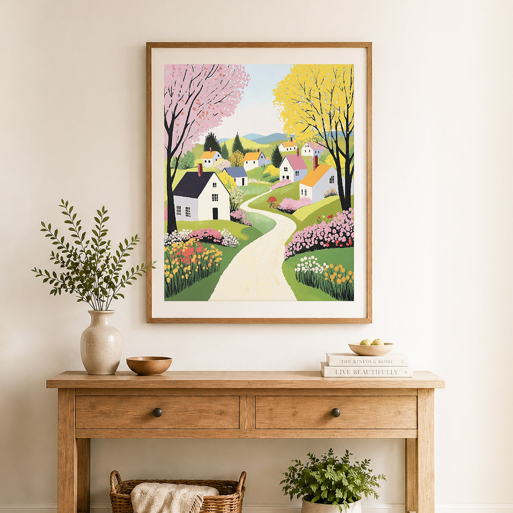 Finished spring country village cross stitch artwork displayed as home decor