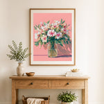 Finished spring floral bouquet cross stitch artwork displayed as home decor