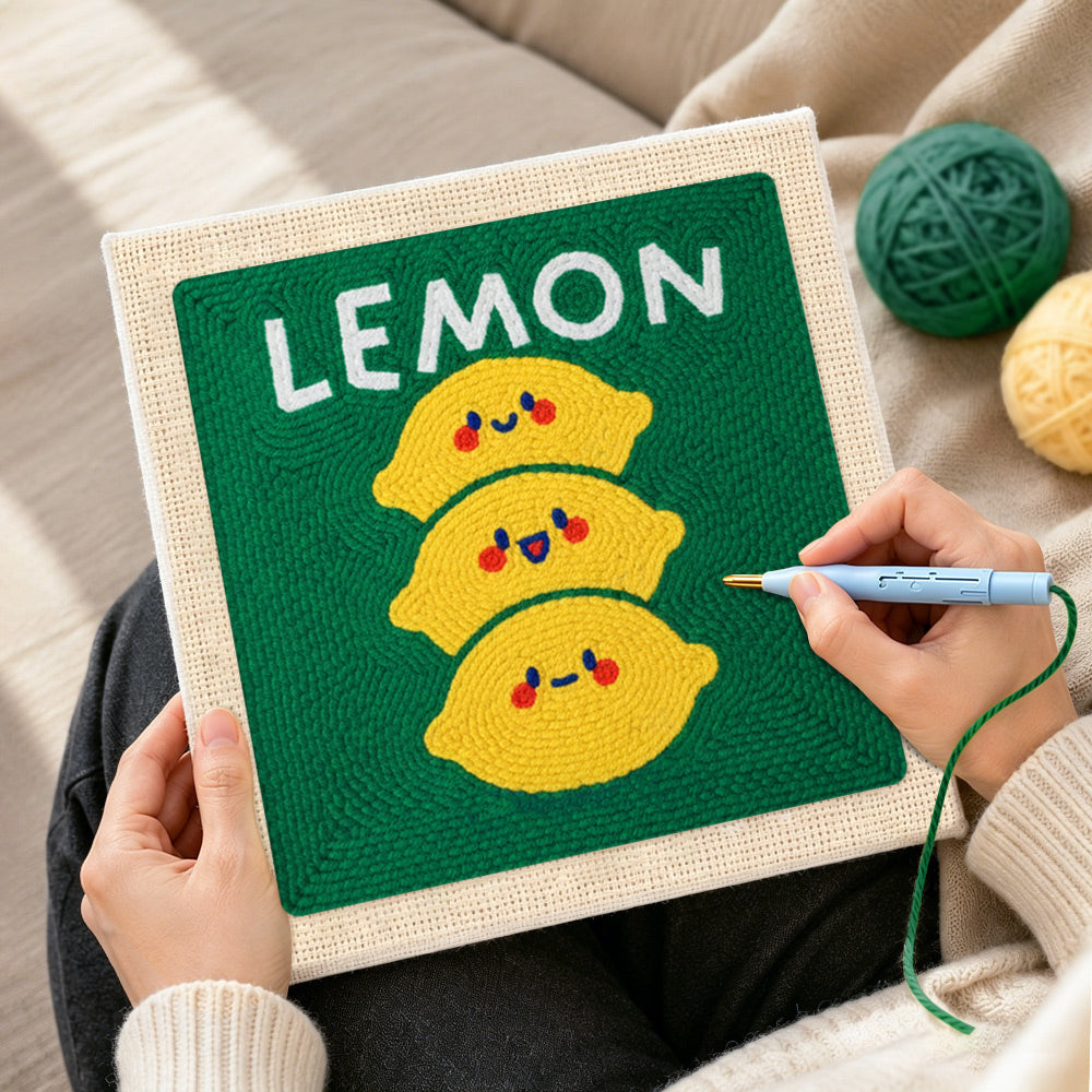 Creating handmade stack of three cute lemons punch needle artwork