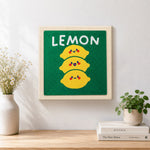 Finished stack of three cute lemons artwork displayed on a wall