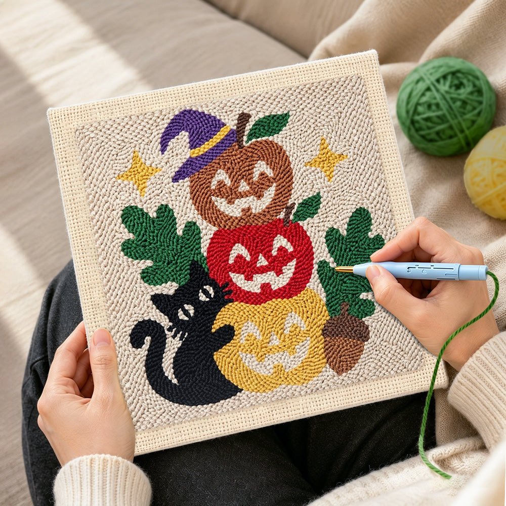 Creating handmade stacked pumpkins with black cat punch needle artwork