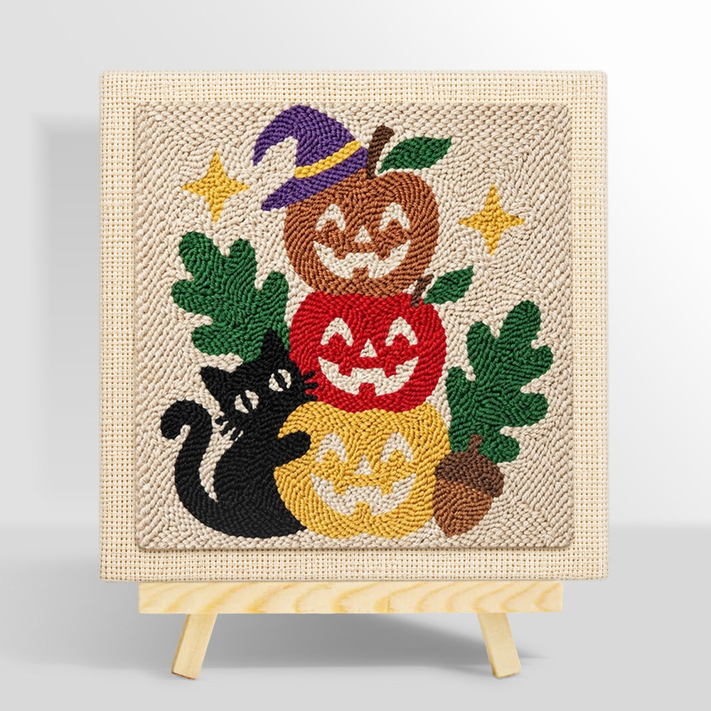 Stacked pumpkins with black cat punch needle kit for beginners