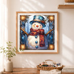 Finished stained glass style snowman cross stitch artwork displayed as home decor