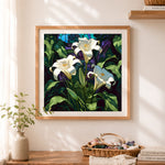 Finished stained glass white lilies cross stitch artwork displayed as home decor