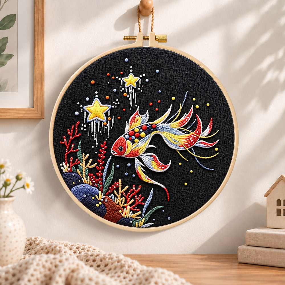 Star and coral koi embroidery hoop wall art displayed as warm and cozy handmade home decor