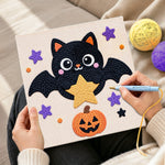 Creating handmade star‑holding bat punch needle artwork