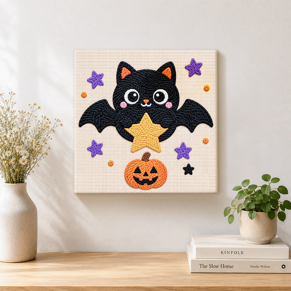 Finished star‑holding bat artwork displayed on a wall